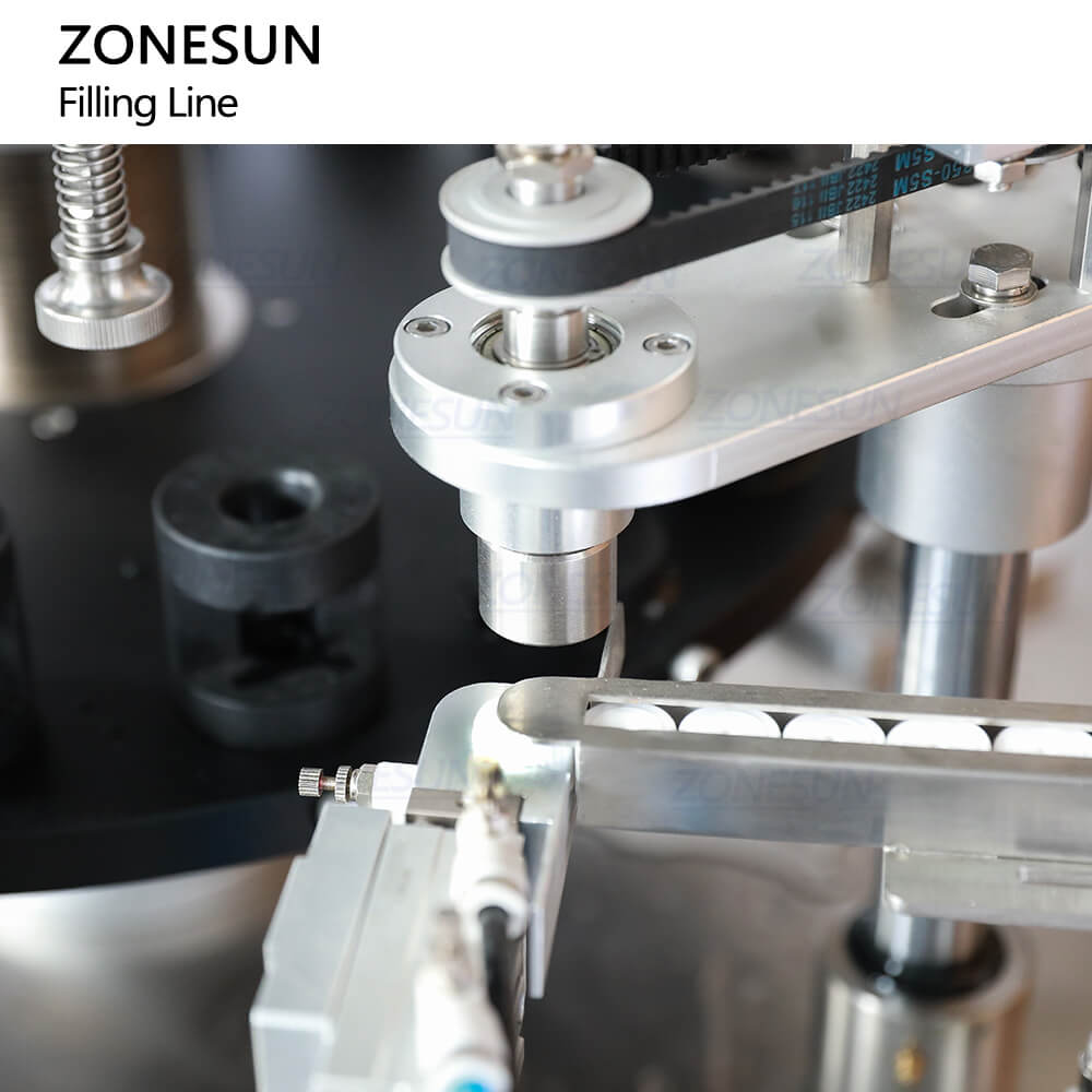 cap feeding structure of essential oils packaging machine