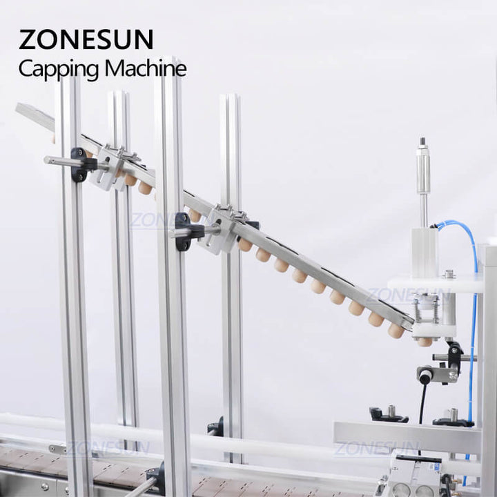 desktop capping machine with cap feeder
