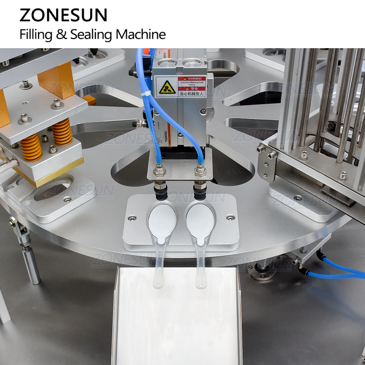 outlet of honey spoon filling sealing machine
