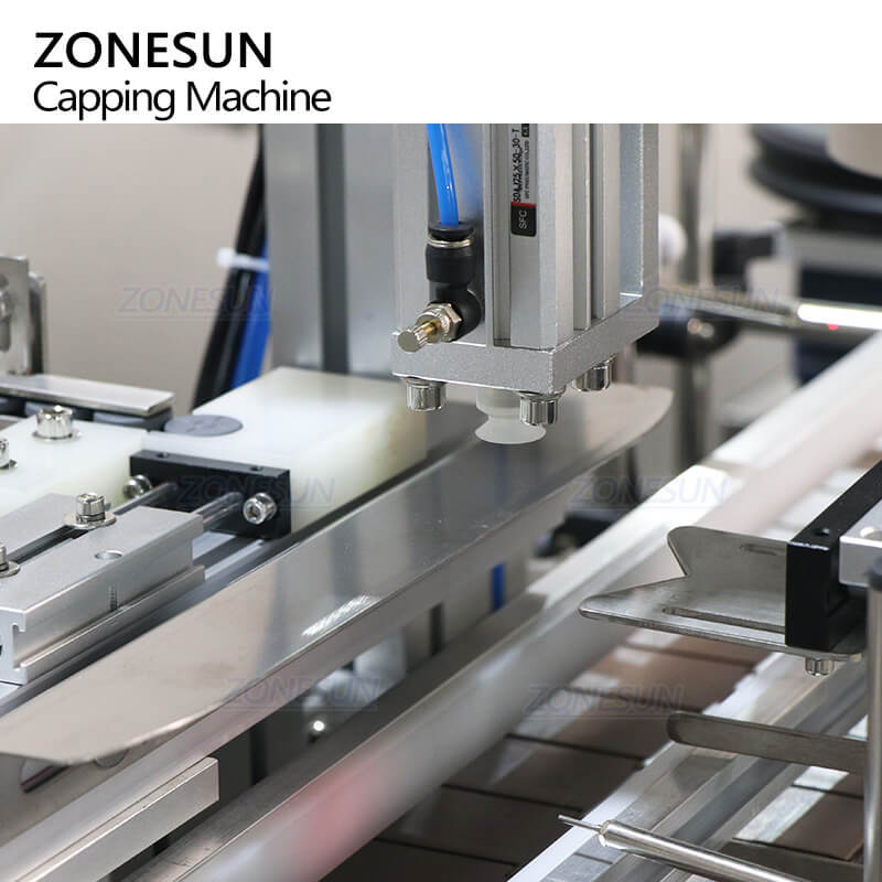 cap pick placing system of automatic lid pressing machine