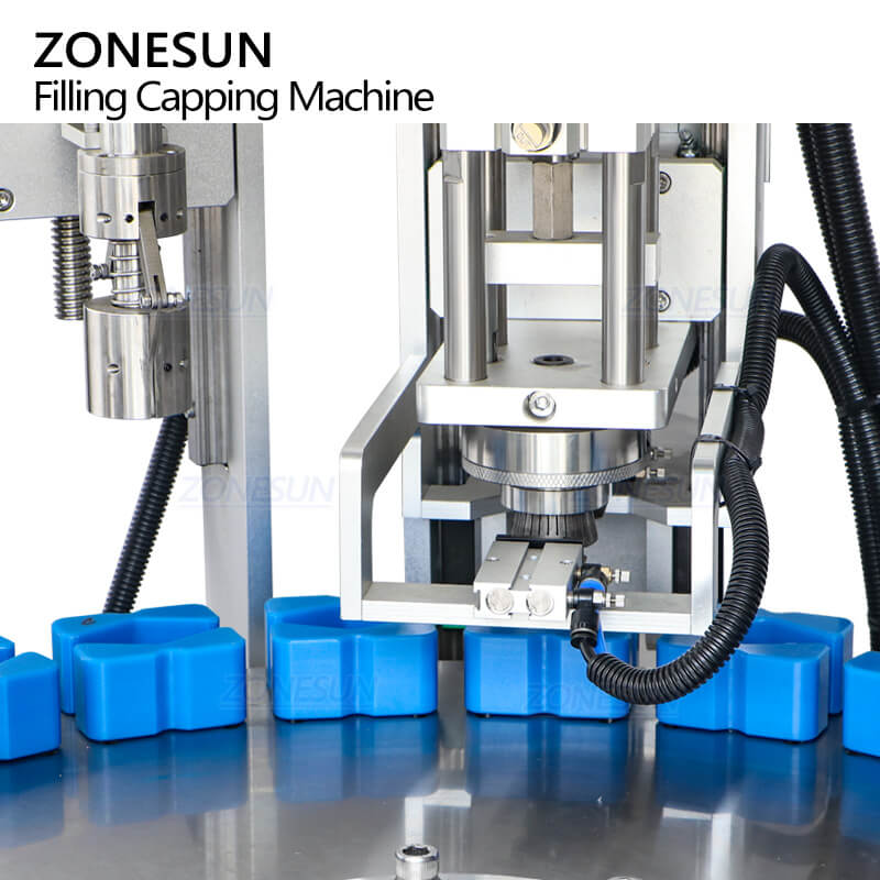 caps crimping system of perfume packing machine