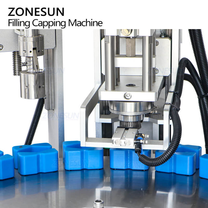 caps crimping system of perfume packing machine