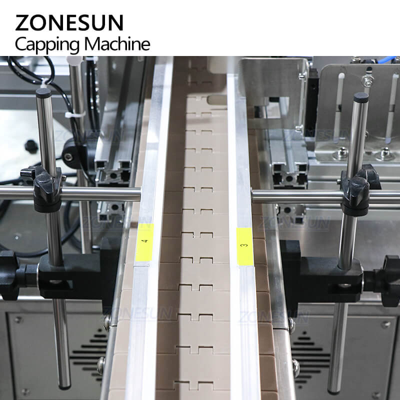 conveyor system of automatic cap pressing machine for vial