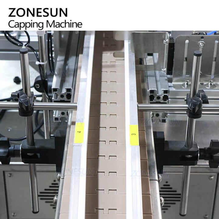 conveyor system of automatic cap pressing machine for vial