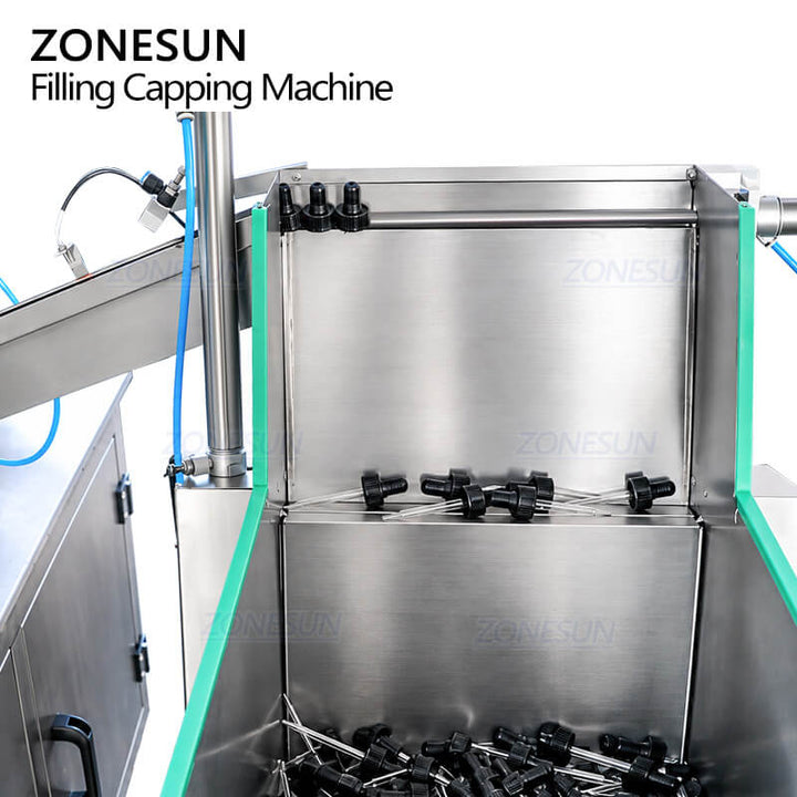 dropper cap feeding system of automatic filling machine