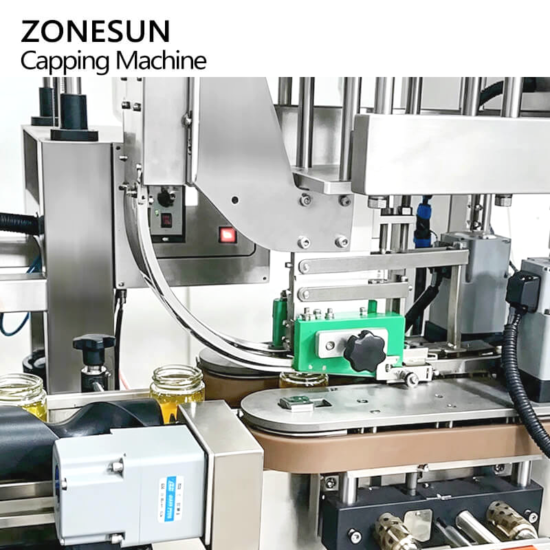 cap feeding system of vacuum sealing machine for glass jars