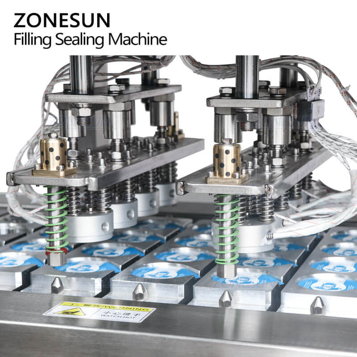 sealing system of dairy cup filling machine