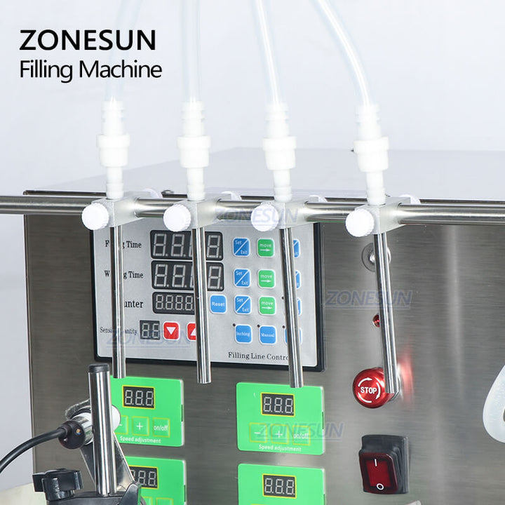 filling nozzle of 4 heads Automatic Desktop Liquid Filling Machine With Conveyor